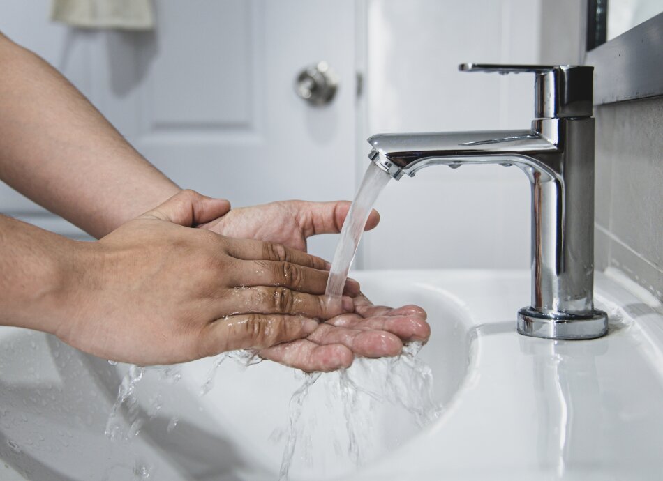 Hand washing at the basin