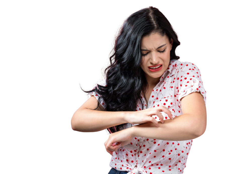 Dark haired woman scratching her arm