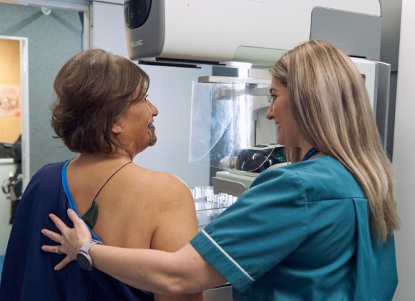 Woman having mammogram in New Zealand