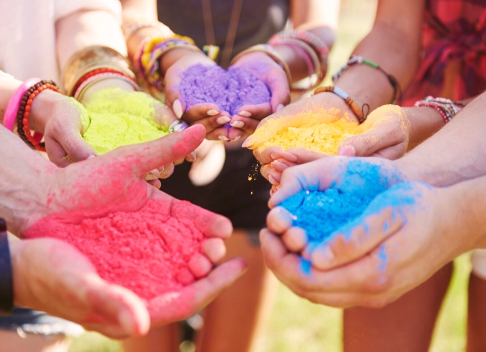 Coloured sand in hands 