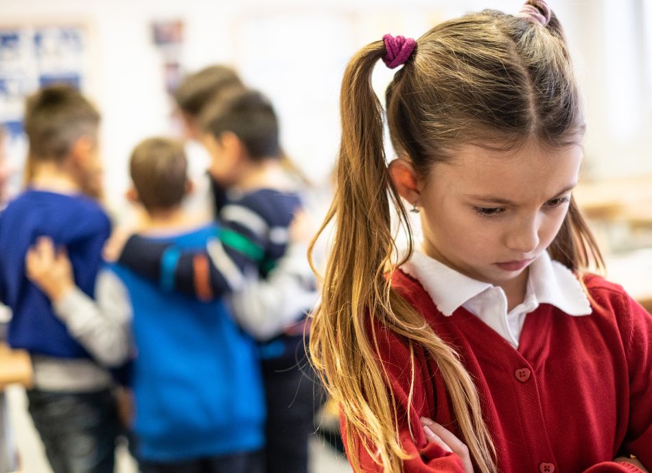 Worried girl being left out or bullied at school