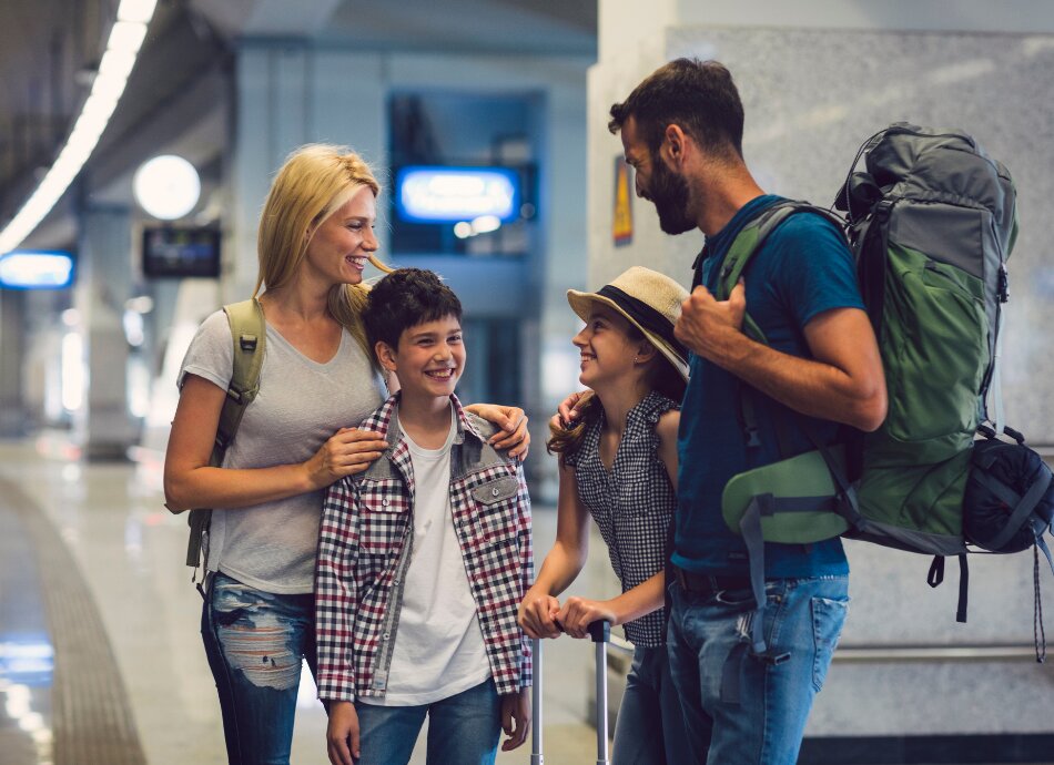 Family of 4 off travelling at airport