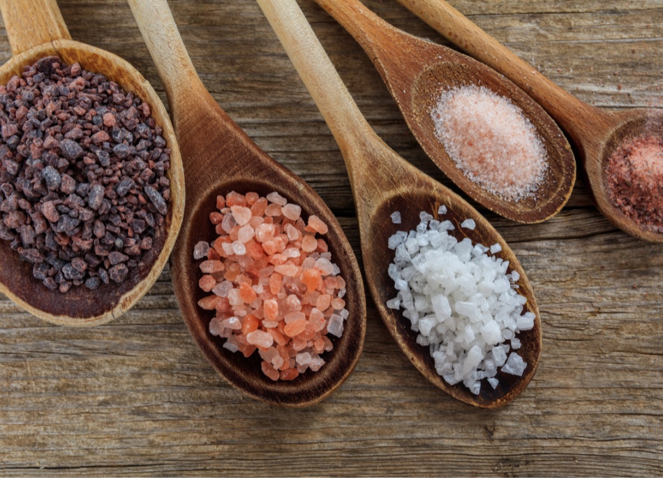 Variety of salts on spoons