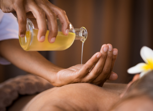 Essential oil being used for massage