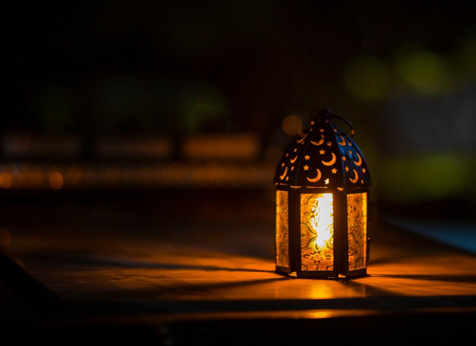 Ramadan light on table Canva