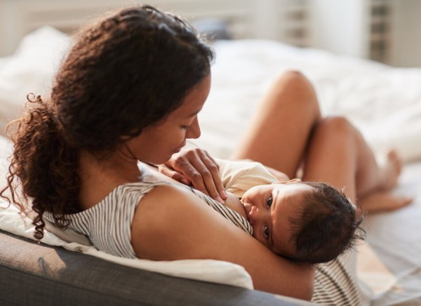 Mother breastfeeding baby