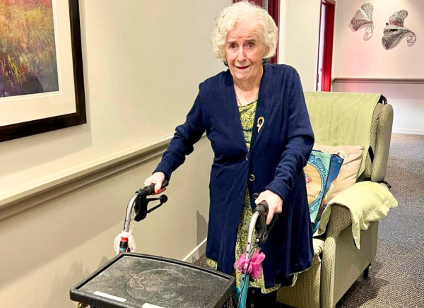 Senior woman uses walker