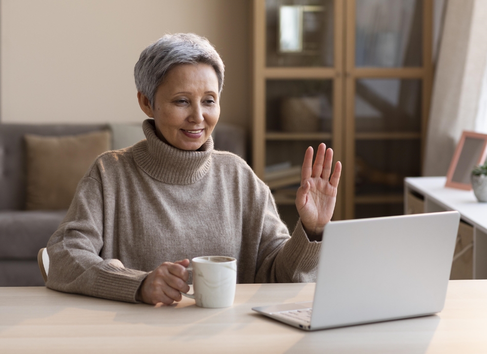 Woman talking online to family 