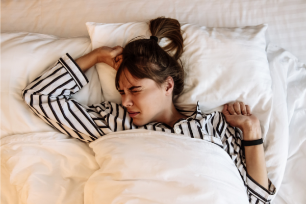 Young woman having trouble sleeping