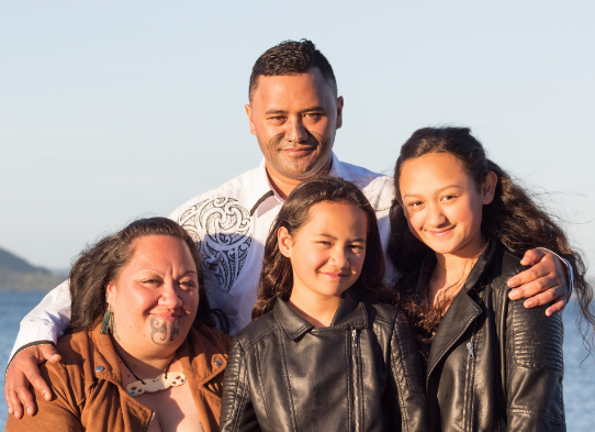 Māori whanau by the sea