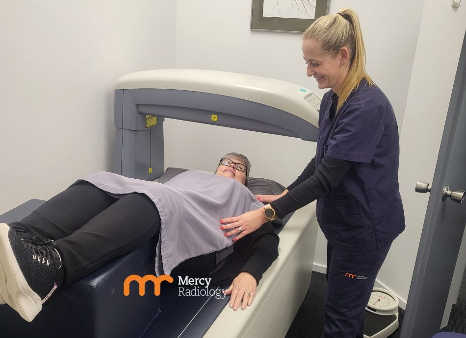 Woman having DEXA scan at Mercy Radiology