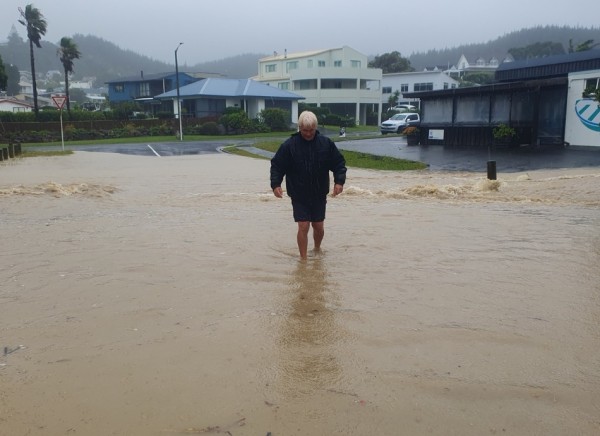 Flooded street in Coromandel, New Zealand
