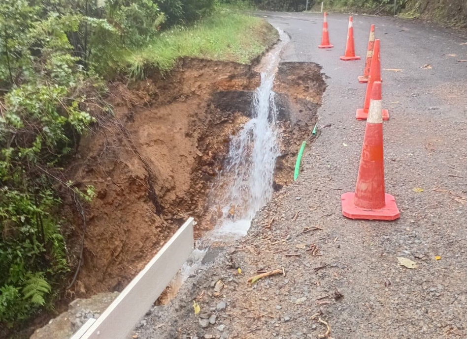 Road slip with road cones Coromandel New Zealand