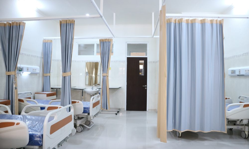 Hospital ward with empty beds