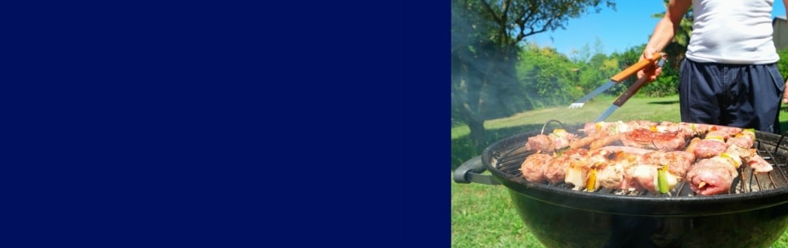 Summer barbeque with meat cooking